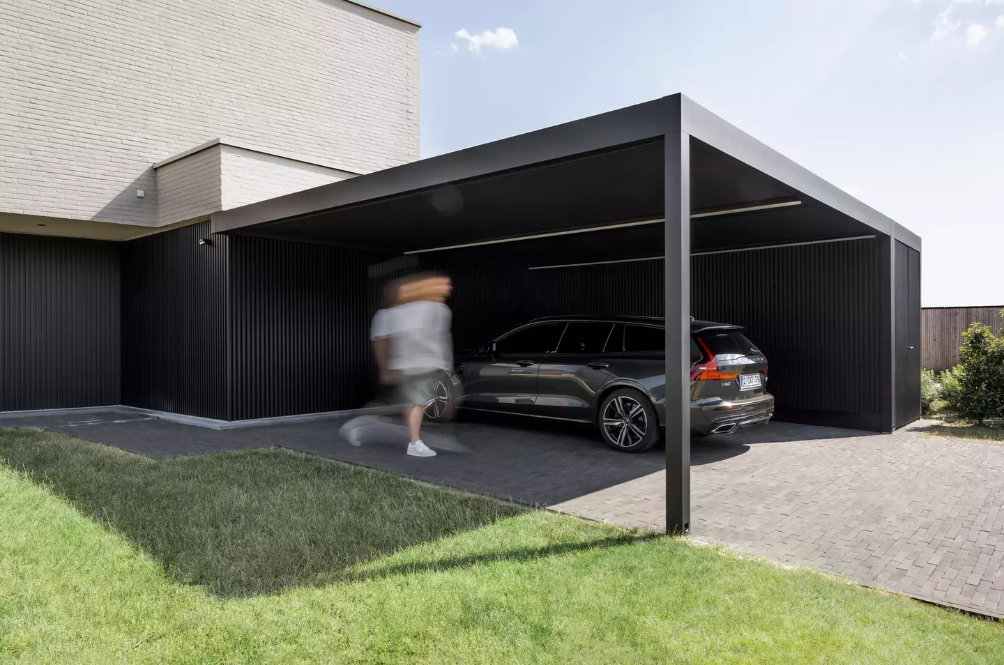 Renson carport protecting motorcycles